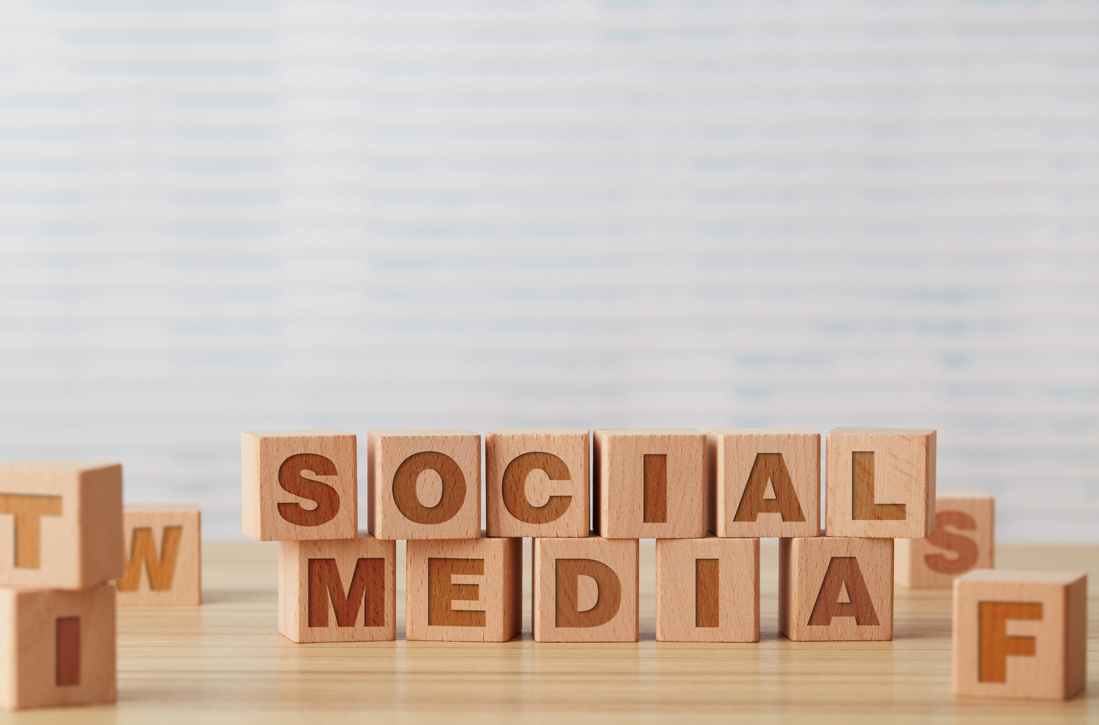 Social media concept with toy cubes